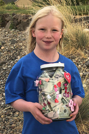 Wish Kid holding money jar