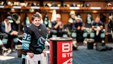 Jackson in the locker room with Kraken players 