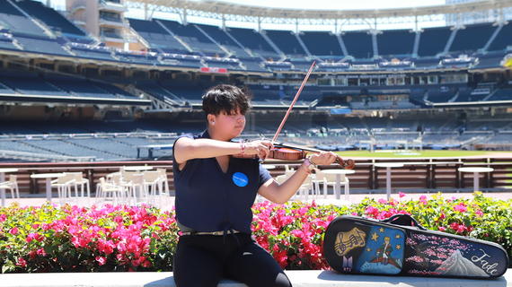 Jade concentrates playing violin