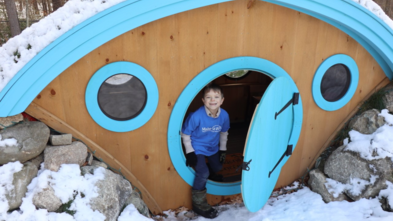 Drew in the doorway of his Hobbit Hole 