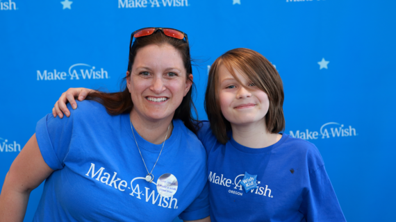 Danton celebrates his wish coming true with Volunteer Wish Granter Megan